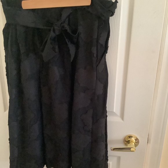 Black a-line skirt with black appliqué and tie front Karl lagerfield. Large - Picture 1 of 4